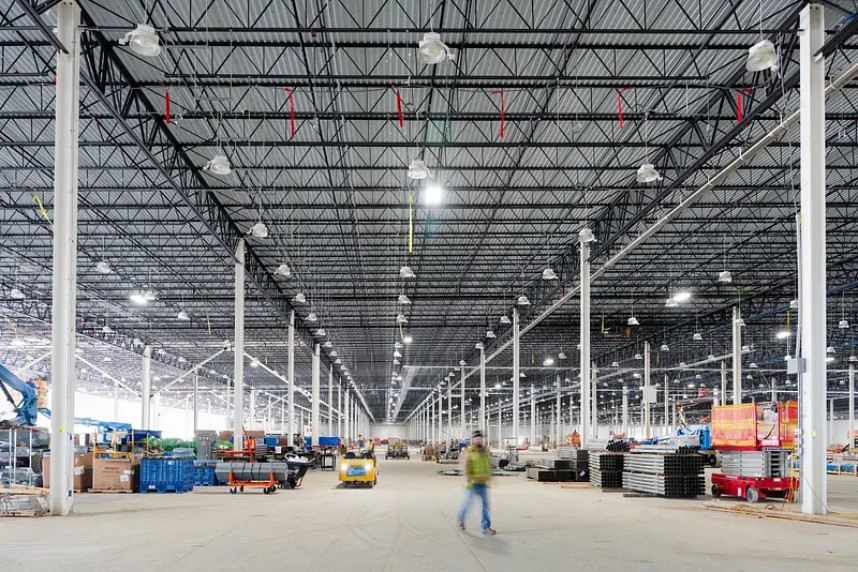 Large empty industrial hall prepared for plant expansion
