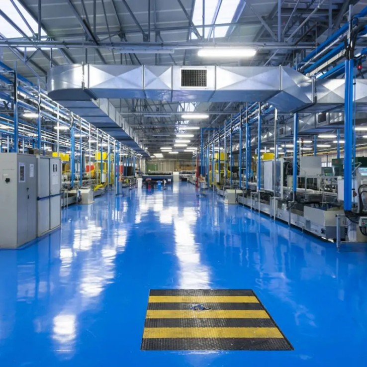 Blue industrial epoxy floor in a production hall