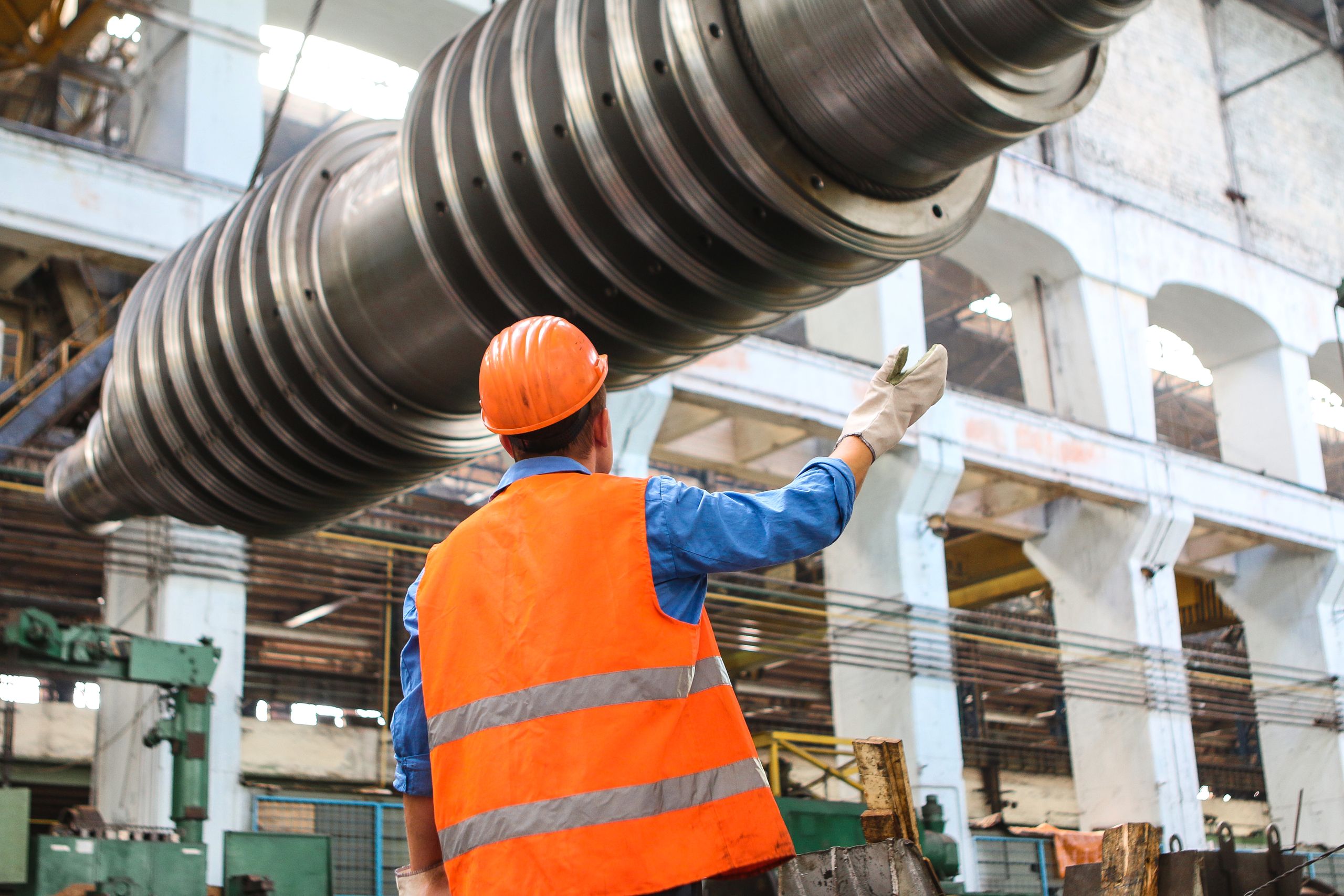 HMT team positioning a machine inside an existing plant